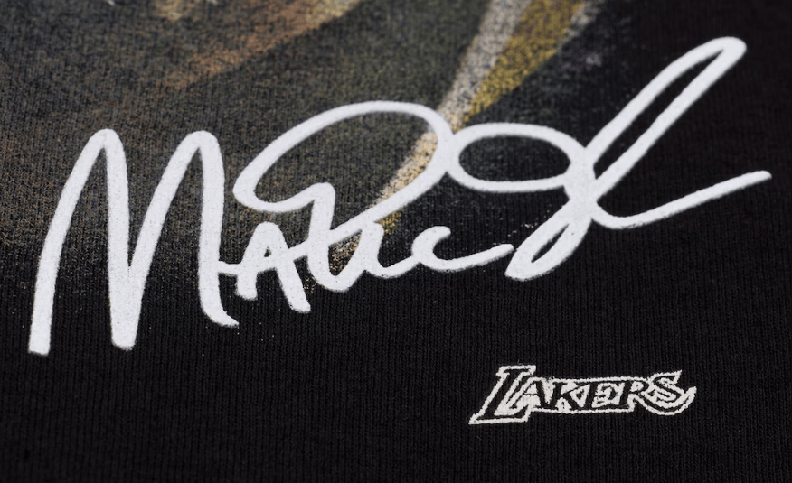 Mitchell & Ness Shirts Adult Magic Johnson Los Angeles Lakers Mitchell & Ness Black Real NBA Big Face T-Shirt - Men's